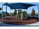 playground with shade structure and play equipment at 8902 Sydney Ave, Kissimmee, FL 34747