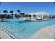 Relax and enjoy this large resort-style pool with a pergola and plenty of lounge seating at 8902 Sydney Ave, Kissimmee, FL 34747