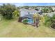 Aerial view of the home, highlighting the private pool and backyard oasis at 9856 Heron Pointe Dr, Orlando, FL 32832