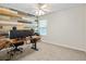 Home office featuring a stylish wood wall accent and ample workspace at 9856 Heron Pointe Dr, Orlando, FL 32832