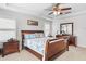 Spacious main bedroom with a king-size bed and ample natural light at 9856 Heron Pointe Dr, Orlando, FL 32832