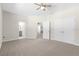 Bright bedroom with plush carpeting and en-suite bathroom at Tbd Sw 93 St, Dunnellon, FL 34432