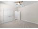 Spacious bedroom with double doors and neutral decor at Tbd Sw 93 St, Dunnellon, FL 34432