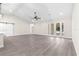 Open and bright living room, featuring hardwood floors and high ceilings at Tbd Sw 93 St, Dunnellon, FL 34432