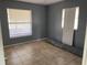 Simple bedroom with tile flooring and gray walls at 102 San Blas Ave, Kissimmee, FL 34743