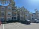 Two-story building with multiple units and parking at 1071 S Hiawassee Rd # 1213, Orlando, FL 32835