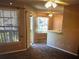 Bright living room with carpet, ceiling fan, and access to balcony at 1071 S Hiawassee Rd # 1213, Orlando, FL 32835