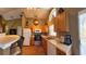 Well-equipped kitchen with ample counter space and wood cabinets at 1138 Mariner Cay Dr, Haines City, FL 33844