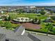 This aerial view shows the serene community layout, enhanced by verdant landscapes and peaceful surroundings at 11526 Comic Aly, Orlando, FL 32832