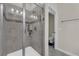 Shower stall with glass enclosure and adjacent toilet at 11526 Comic Aly, Orlando, FL 32832