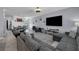 An open concept living room with a dining area, allowing for seamless entertaining and everyday living at 11526 Comic Aly, Orlando, FL 32832