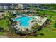 Resort-style pool with lounge chairs and palm trees at 11526 Comic Aly, Orlando, FL 32832