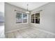 Breakfast nook with tile floor and a window seat at 116 Whispering Pines Way, Davenport, FL 33837