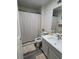 Clean bathroom with shower, toilet, vanity, and updated fixtures at 1238 Conch Key Ln, Davenport, FL 33837