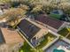 Aerial view of a house with backyard, patio, and pool at 13013 Quail Ct, Orlando, FL 32828