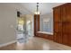 Bright breakfast nook with built-in cabinetry and access to the backyard at 13013 Quail Ct, Orlando, FL 32828