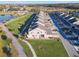 Aerial view showing a row of townhouses and a walking path at 13715 Bressler Aly, Windermere, FL 34786