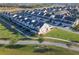 Wide aerial view of the neighborhood, showing many homes at 13715 Bressler Aly, Windermere, FL 34786