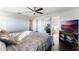 Spacious main bedroom featuring a king bed and full bathroom view at 13715 Bressler Aly, Windermere, FL 34786