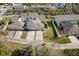 Aerial view of home with private driveway and yard at 14624 Clarkson Dr, Orlando, FL 32828