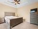 Bright bedroom with carpeted floors and ceiling fan at 14624 Clarkson Dr, Orlando, FL 32828