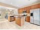 Modern kitchen with stainless steel appliances and an island at 14624 Clarkson Dr, Orlando, FL 32828