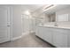 Bathroom featuring tile flooring, neutral paint and a double sink vanity at 1470 Silverado Flats St, Kissimmee, FL 34744