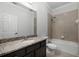 Clean bathroom with granite countertop and shower/tub combo at 15925 St Clair St, Clermont, FL 34714