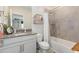 Clean bathroom with tub, shower, and vanity at 1860 Black Maple Pl, Ocoee, FL 34761