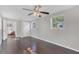 Bedroom featuring hardwood floors, neutral walls, and a closet for ample storage at 2106 Cordova Dr, Sanford, FL 32771