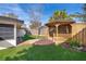 Charming backyard with gazebo and well-manicured lawn at 2247 King Edwards Ct, Winter Park, FL 32792