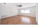 Bright bedroom with hardwood floors and a ceiling fan at 2247 King Edwards Ct, Winter Park, FL 32792