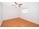 Bright bedroom featuring wood flooring and ceiling fan at 2247 King Edwards Ct, Winter Park, FL 32792