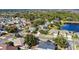 Aerial view of house and surrounding neighborhood at 2446 Leaning Pine Ln, Oviedo, FL 32765