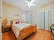 Bedroom with a double bed and large closet at 2446 Leaning Pine Ln, Oviedo, FL 32765