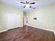 Bedroom with hardwood floors and double door closet at 2511 Madron Ct, Orlando, FL 32806