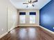 Bedroom with hardwood floors and ceiling fan at 2511 Madron Ct, Orlando, FL 32806