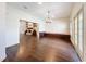 Bright dining area with hardwood floors and access to kitchen at 2511 Madron Ct, Orlando, FL 32806