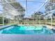 Inviting screened pool with ample deck space at 2511 Madron Ct, Orlando, FL 32806