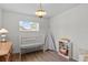 Light-filled Bedroom with charming teepee, a bookshelf, and comfortable sleeping area at 2823 Cady Way, Winter Park, FL 32792
