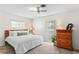 Main bedroom with king-size bed and ample natural light at 2823 Cady Way, Winter Park, FL 32792