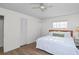 Spacious bedroom offers bright natural light, wood-look floors, and closet for ample storage at 2823 Cady Way, Winter Park, FL 32792
