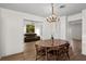 Dining room with chandelier and view of the living room at 2823 Cady Way, Winter Park, FL 32792