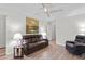 Living room featuring wood floors and comfortable seating at 2823 Cady Way, Winter Park, FL 32792