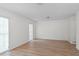 Bright and airy living room featuring wood flooring and light neutral paint at 2823 Cady Way, Winter Park, FL 32792