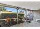 Screened porch with a view of the backyard at 2823 Cady Way, Winter Park, FL 32792