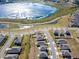 Aerial view of houses and lake at 2949 Muller Oak Loop, Ocoee, FL 34761