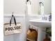 Clean bathroom with pedestal sink and white walls at 2949 Muller Oak Loop, Ocoee, FL 34761