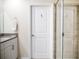 Bathroom with a shower and a door to another room at 2949 Muller Oak Loop, Ocoee, FL 34761