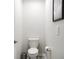 Small, clean bathroom with toilet and minimalist decor at 2949 Muller Oak Loop, Ocoee, FL 34761